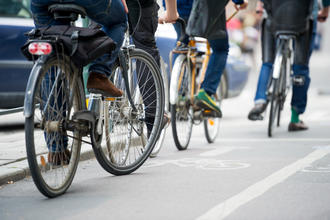 Examining what impacts biking behavior beyond the bike lane: Climate and health co-benefits